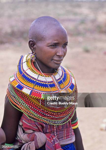 Samburu woman wearing her bead necklaces jewelry, at her remote village in Samburu National Reserve, Kenya, East Africa, 2013. .