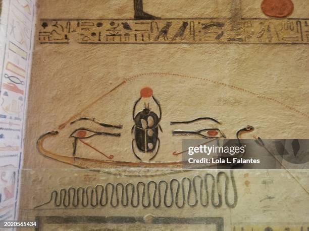 eyes and beetle. egyptian paintings and hieroglyphics.tomb of ramses ix. valley of the kings, egypt - ix stock pictures, royalty-free photos & images