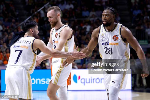 Facundo Campazzo player of Real Madrid celebrate with teammates Guerschon Yabusele and Dzanan Musa in action during the Semi Final 2024 Copa del Rey...