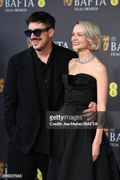 Marcus Mumford and Carey Mulligan attend the EE BAFTA Film Awards 2024 at The Royal Festival Hall on February 18, 2024 in London, England.