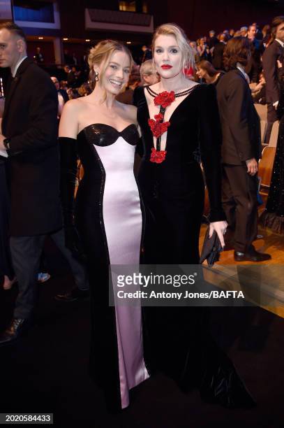 Margot Robbie and Emerald Fennell attend the EE BAFTA Film Awards 2024 at The Royal Festival Hall on February 18, 2024 in London, England.