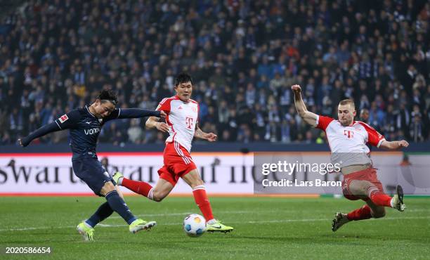 Takuma Asano of VfL Bochum scores his team's first goal during the Bundesliga match between VfL Bochum 1848 and FC Bayern München at Vonovia...