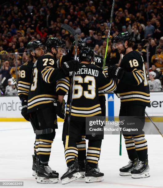 James van Riemsdyk of the Boston Bruins celebrates his second of two goal against the Los Angeles Kings with teammates David Pastrnak, Charlie...