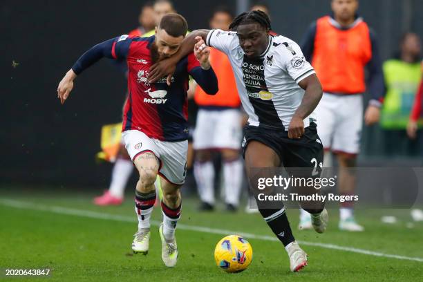 Nahitan Nandez of Cagliari and Ebosele Festy of Udinese compete for the ball during the Serie A TIM match between Udinese Calcio and Cagliari - Serie...