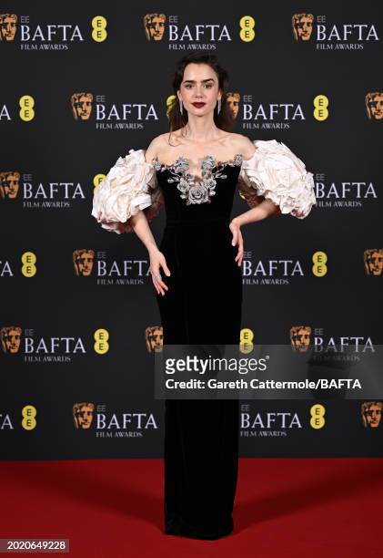 Lily Collins poses in the Winners Room during the EE BAFTA Film Awards 2024 at The Royal Festival Hall on February 18, 2024 in London, England.