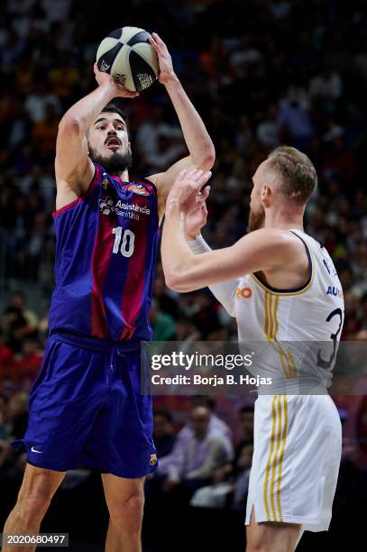 Dzanan Musa of Real Madrid and Nicola Kalinic of FC Barcelona in action during the Finals of the 2024 Copa del Rey de Baloncesto match between Real...