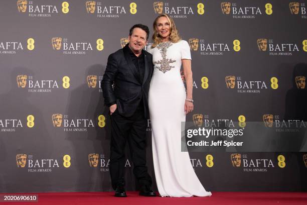 Michael J. Fox and Tracy Pollan attend the 2024 EE BAFTA Film Awards at The Royal Festival Hall on February 18, 2024 in London, England.