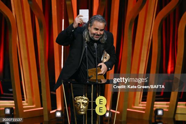 Hoyte van Hoytema accepts the Cinematography Award for 'Oppenheimer' during the 2024 EE BAFTA Film Awards, held at the Royal Festival Hall on...