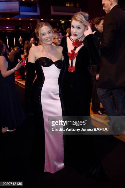 Margot Robbie and Emerald Fennell attend the EE BAFTA Film Awards 2024 at The Royal Festival Hall on February 18, 2024 in London, England.