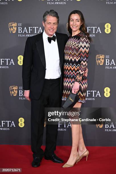 Hugh Grant and Anna Elisabet Eberstein attend the 2024 EE BAFTA Film Awards at The Royal Festival Hall on February 18, 2024 in London, England.