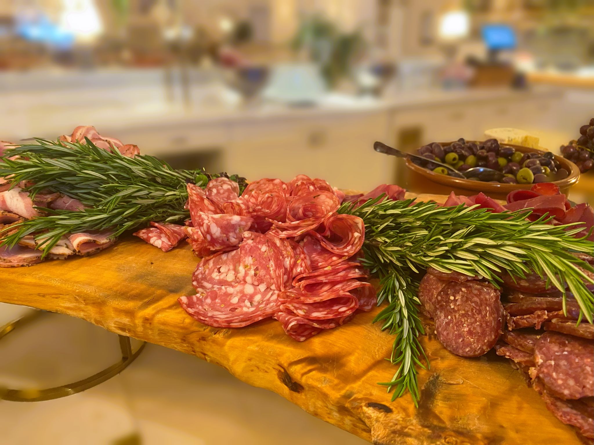 Buffet offering a variety of salami slices Buffet offering a variety of salami slices