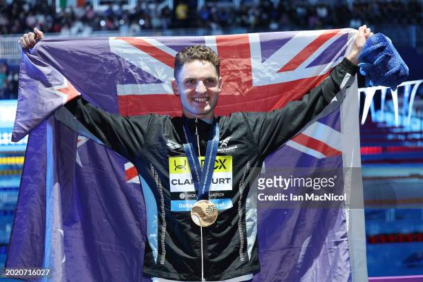 Lewis Clareburt of New Zealand is seen with his gold medal from the Men's 400m IM on day seventeen of the Doha 2024 World Aquatics Championships at...