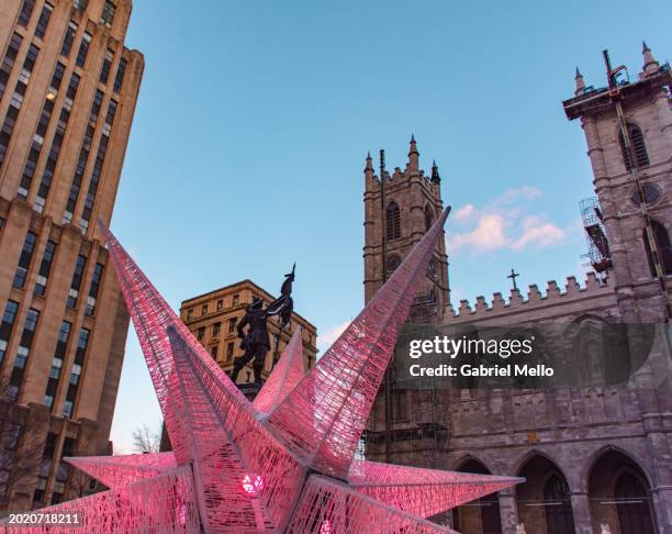 old montreal in front of notre dame cathedral - old montreal stock pictures, royalty-free photos & images