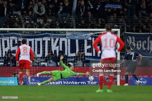 Kevin Stoeger of VfL Bochum scores his team's third goal from the penalty spot past Manuel Neuer of Bayern Munich during the Bundesliga match between...