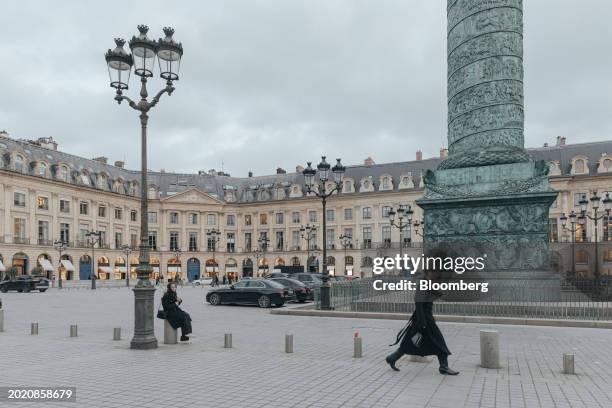 Pedestrian walks through the Place Vendome luxury retail area in central Paris, France, on Tuesday, Feb. 21, 2024. Finance Minister Bruno Le...