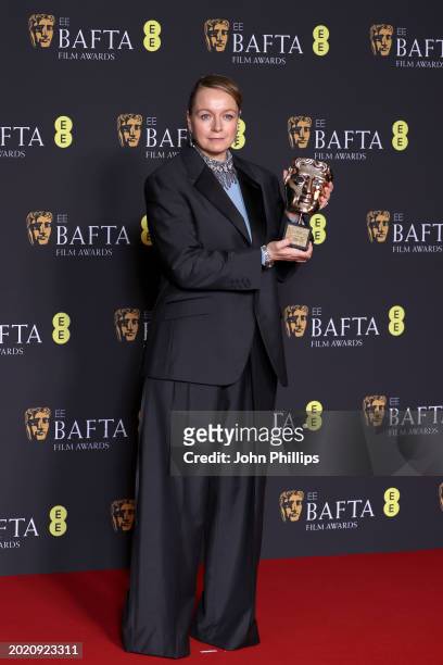 Samantha Morton poses with the Fellowship Award in the winners room at the 2024 EE BAFTA Film Awards at The Royal Festival Hall on February 18, 2024...