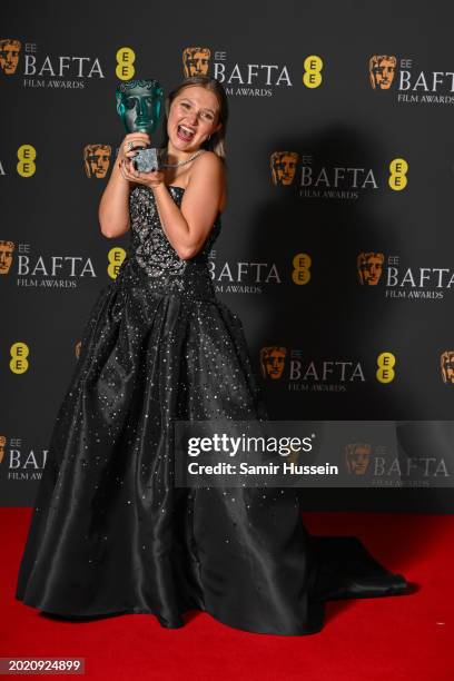 Mia McKenna-Bruce poses with the EE Rising Star Award in the winners room at the 2024 EE BAFTA Film Awards at The Royal Festival Hall on February 18,...