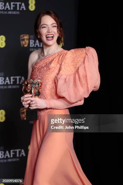 Emma Stone poses in the Winners Room with the Leading Actress Award during the EE BAFTA Film Awards 2024 at The Royal Festival Hall on February 18,...