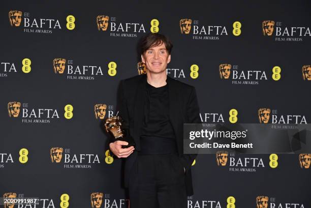 Cillian Murphy poses with the Leading Actor Award in the winners room during the 2024 EE BAFTA Film Awards at The Royal Festival Hall on February 18,...