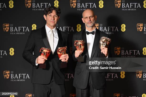 Jonathan Glazer and James Wilson with the Outstanding British Film award for 'The Zone of Interest' in the winners room at the 2024 EE BAFTA Film...