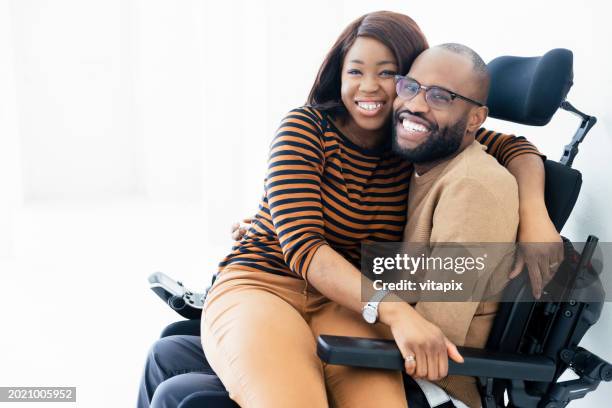 loving couple - interabled - multiple sclerosis stock pictures, royalty-free photos & images