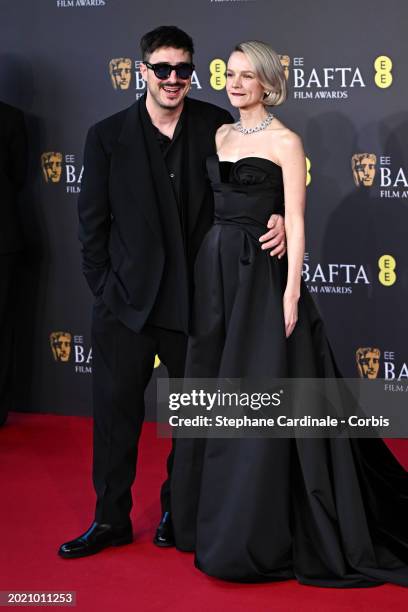 Marcus Mumford and Carey Mulligan attend the 2024 EE BAFTA Film Awards at The Royal Festival Hall on February 18, 2024 in London, England.