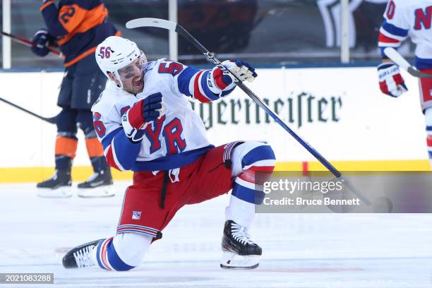 Erik Gustafsson of the New York Rangers celebrates after scoring a goal against the New York Islanders during the first period during the 2024 Navy...