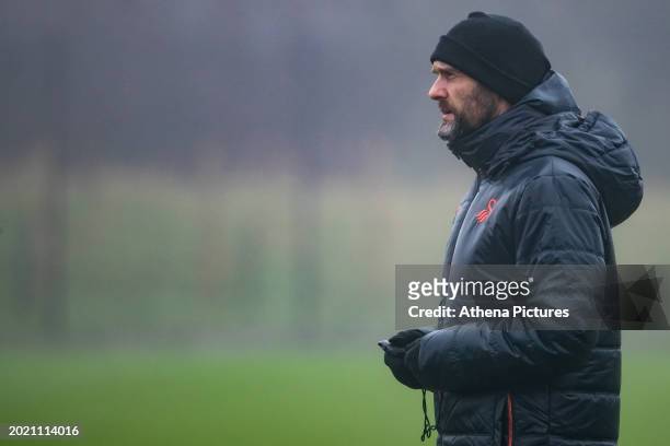 Luke Williams Manager of Swansea City observes the players during the Swansea City Training Session at Fairwood Training Ground on February 21, 2024...