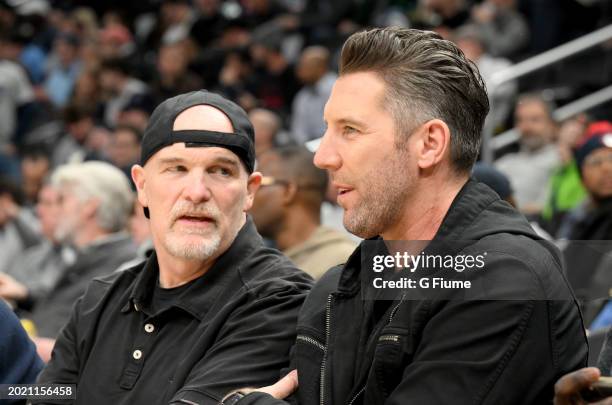 Washington Commanders head coach Dan Quinn and general manager Adam Peters watches the game between the Georgetown Hoyas and the Villanova Wildcats...