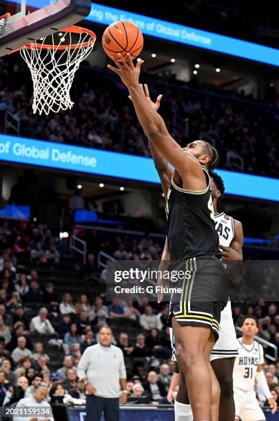 Eric Dixon of the Villanova Wildcats drives to the basket against the Georgetown Hoyas at Capital One Arena on February 16, 2024 in Washington, DC.