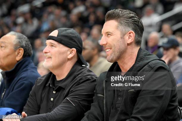 Washington Commanders head coach Dan Quinn and general manager Adam Peters watches the game between the Georgetown Hoyas and the Villanova Wildcats...