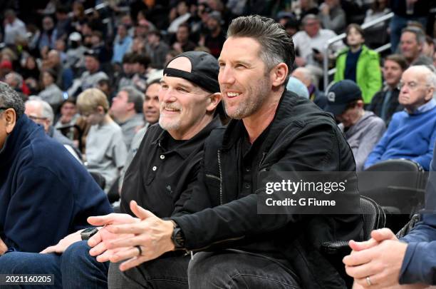 Washington Commanders head coach Dan Quinn and general manager Adam Peters watches the game between the Georgetown Hoyas and the Villanova Wildcats...