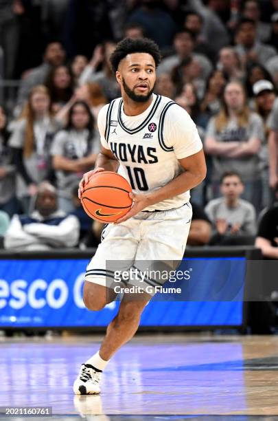 Jayden Epps of the Georgetown Hoyas handles the ball against the Villanova Wildcats at Capital One Arena on February 16, 2024 in Washington, DC.