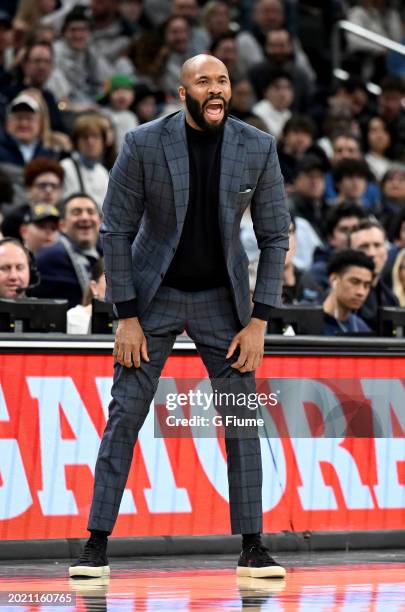 Head coach Kyle Neptune of the Villanova Wildcats watches the game against the Georgetown Hoyas at Capital One Arena on February 16, 2024 in...