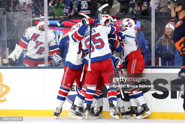 Vincent Trocheck of the New York Rangers is congratulated by his teammates after scoring his second goal of the second period against the New York...