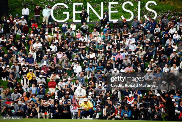 Hideki Matsuyama of Japan lines up a putt on the 18th green during the final round of The Genesis Invitational at Riviera Country Club on February...