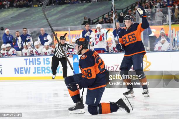 Alexander Romanov of the New York Islanders celebrates after scoring a goal against the New York Rangers during the third period during the 2024 Navy...