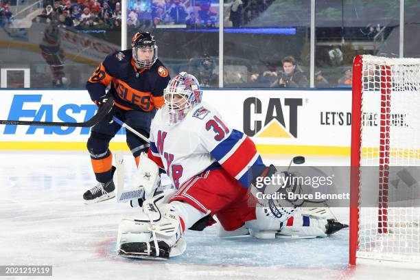 Alexander Romanov of the New York Islanders scores a goal past Igor Shesterkin of the New York Rangers during the third period during the 2024 Navy...