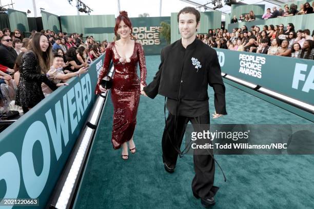 Pictured: Emily Cannon and MAX arrive to the 2024 People's Choice Awards held at Barker Hangar on February 18, 2024 in Santa Monica, California. --