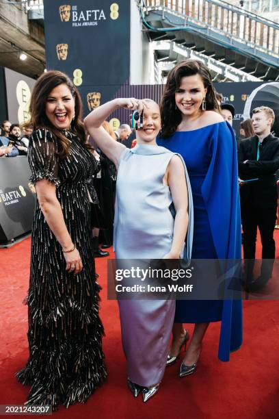 Reemah Sakaan, Lauren Lyle and Emer Kenny attend the EE BAFTA Film Awards 2024 at The Royal Festival Hall on February 18, 2024 in London, England.