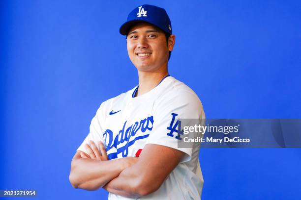 Shohei Ohtani of the Los Angeles Dodgers poses for a photo during the Los Angeles Dodgers Photo Day at Camelback Ranch on Wednesday, February 21,...