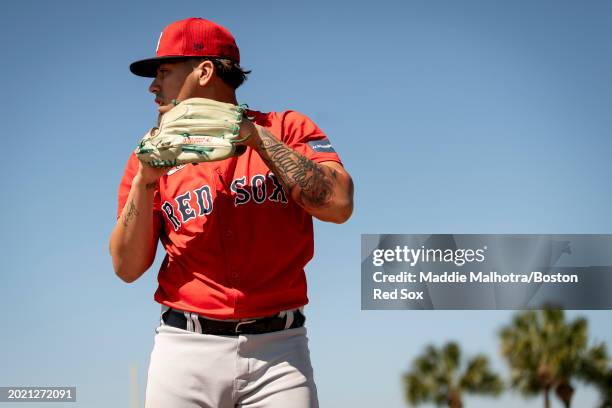 Jorge Benitez of the Boston Red Sox throws live batting practice during a team Spring Training workout at JetBlue Park at Fenway South on February...