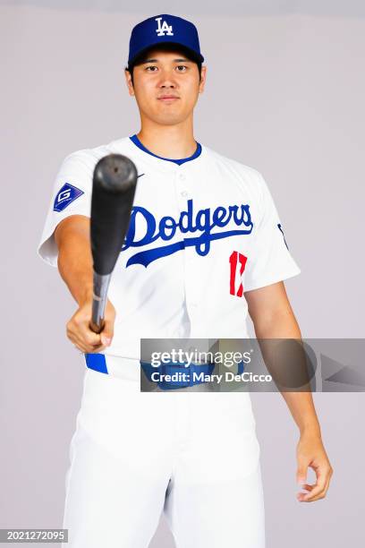 Shohei Ohtani of the Los Angeles Dodgers poses for a photo during the Los Angeles Dodgers Photo Day at Camelback Ranch on Wednesday, February 21,...