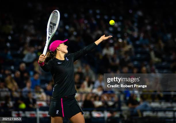 Iga Swiatek of Poland warms in action against Elina Svitolina of Ukraine in the third round on Day 4 of the Dubai Duty Free Tennis Championships,...