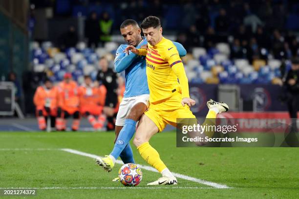 Juan Jesus of SSC Napoli Robert Lewandowski of FC Barcelona during the UEFA Champions League match between Napoli v FC Barcelona at the Stadio Diego...