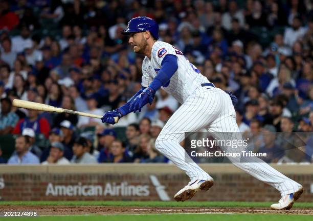 Chicago Cubs center fielder Cody Bellinger drives in a run against the Milwaukee Brewers at Wrigley Field on Aug. 29 in Chicago.