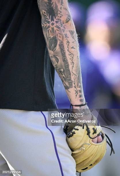Tattoos fill the arm of Kyle Freeland of the Colorado Rockies during Spring Training at Salt River Fields in Scottsdale, Arizona on Wednesday,...
