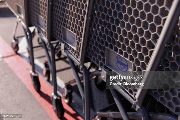 Shopping carts at a Kroger grocery store in Dallas, Texas, US, on Wednesday, Feb. 21, 2024. The US Federal Trade Commission and a group of states are...