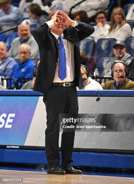 St. Louis head coach Travis Ford gestures to his team during a time out during a college basketball game between the Virginia Commonwealth Rams and...