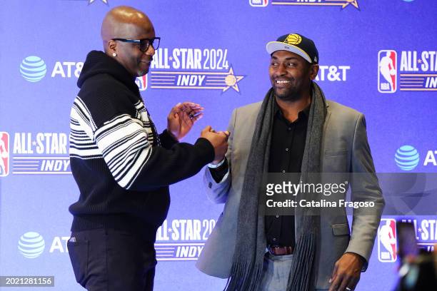 Jermaine O'Neal and Metta World Peace high five during the NBA All-Star Game-VIP Blue Carpet Arrivals as part of NBA All-Star Weekend on Sunday,...